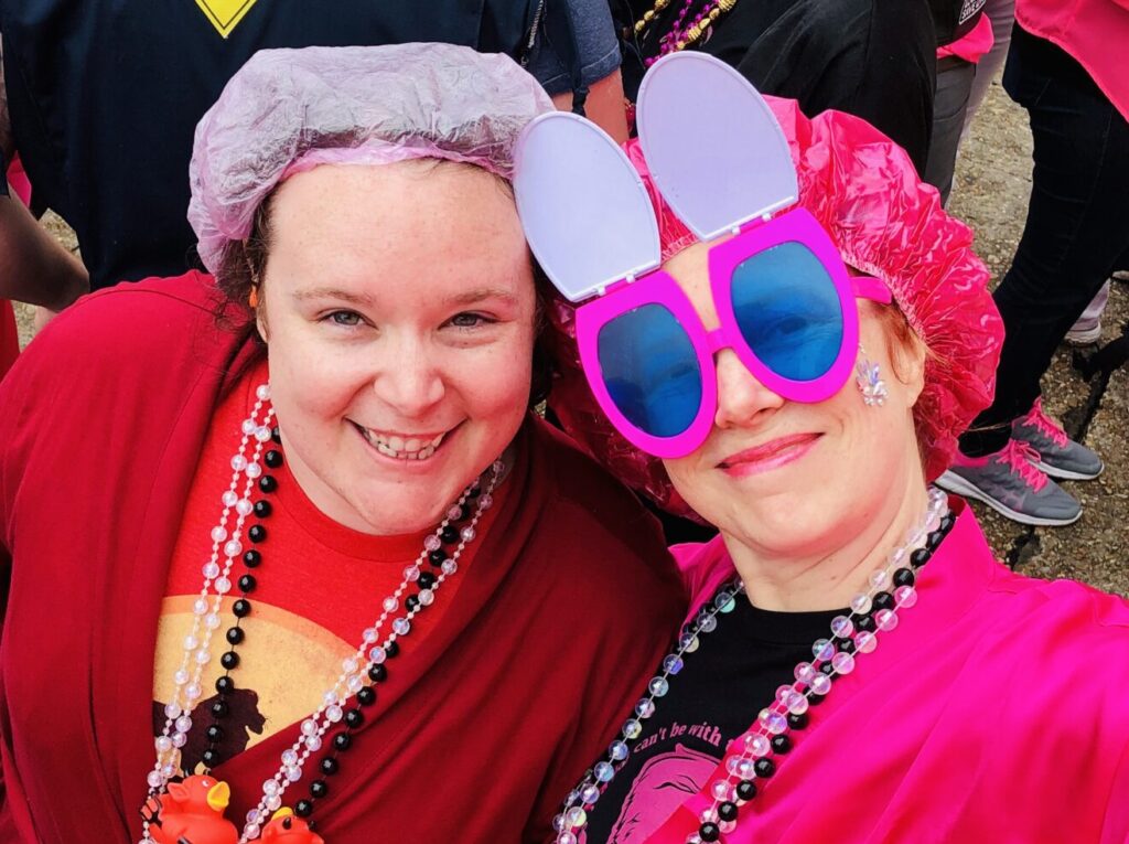 Rachel Sears, Edie White enjoying the 2019 Spanish Town Mardi Gras Parade